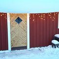 Kundbild Förrådsdörr Heby 18 °C - Med klarglas: Våra förrådsdörr i vinterskrud. Vi...